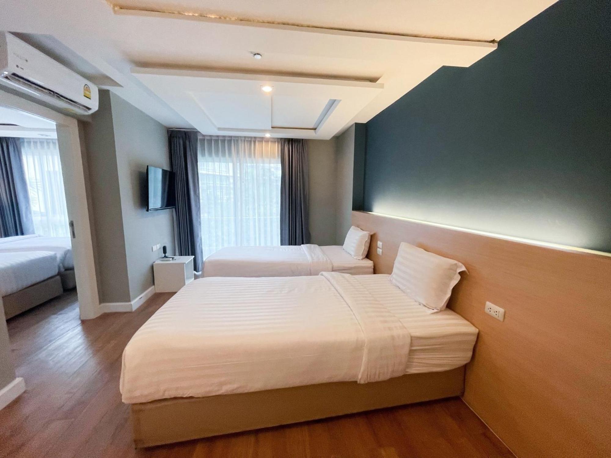 Wisdom Hotel & Residence Районг Екстер'єр фото
