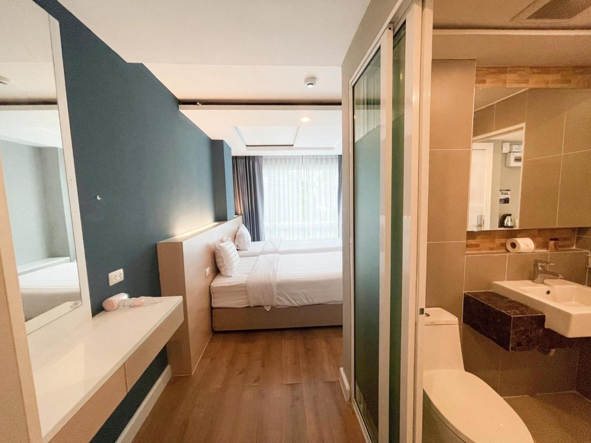 Wisdom Hotel & Residence Районг Екстер'єр фото